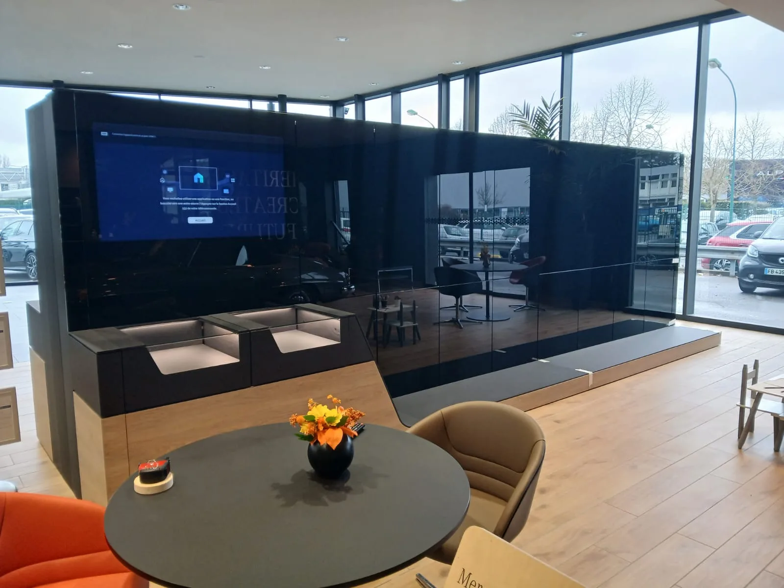 Custom media wall anthracite finish — commercial interior fit-out Portugal by Martinelli Group